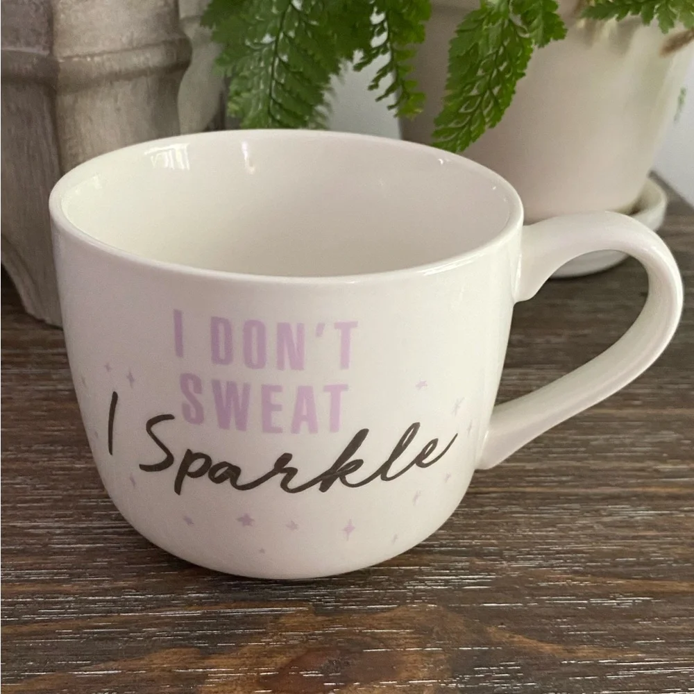 White Ceramic Mug with Black and‎ Pink Text